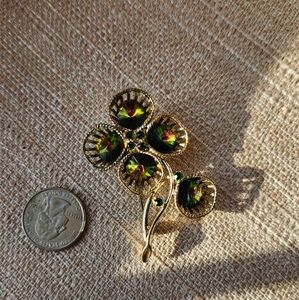 Gold and Green Quatrefoil Brooch with Ornate Detailing